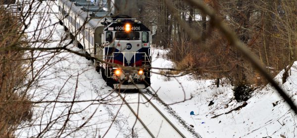 Railroad travel in winter with snow everywhere